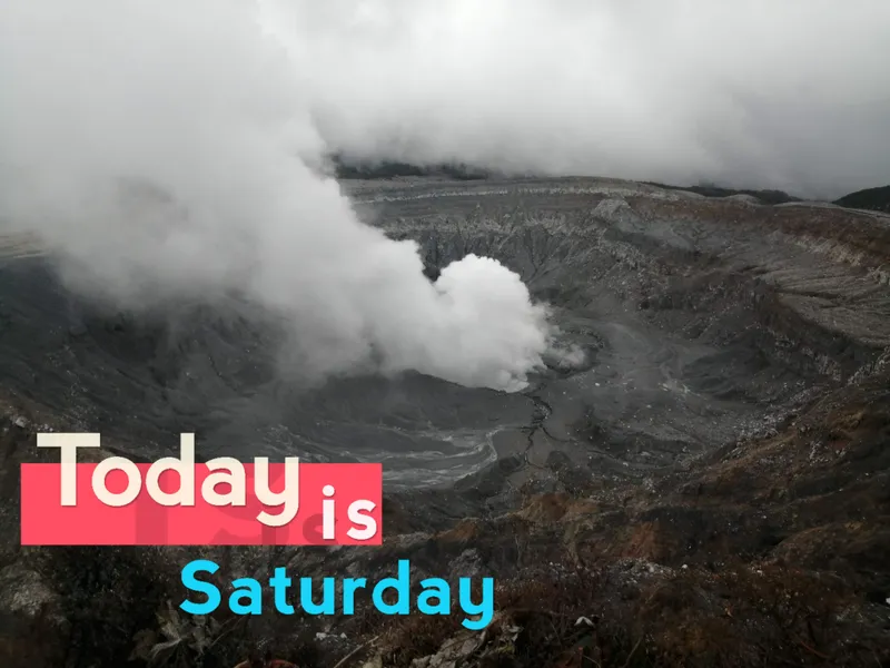 Steam pours across a grey crater floor, with a text sticker added over the photo.